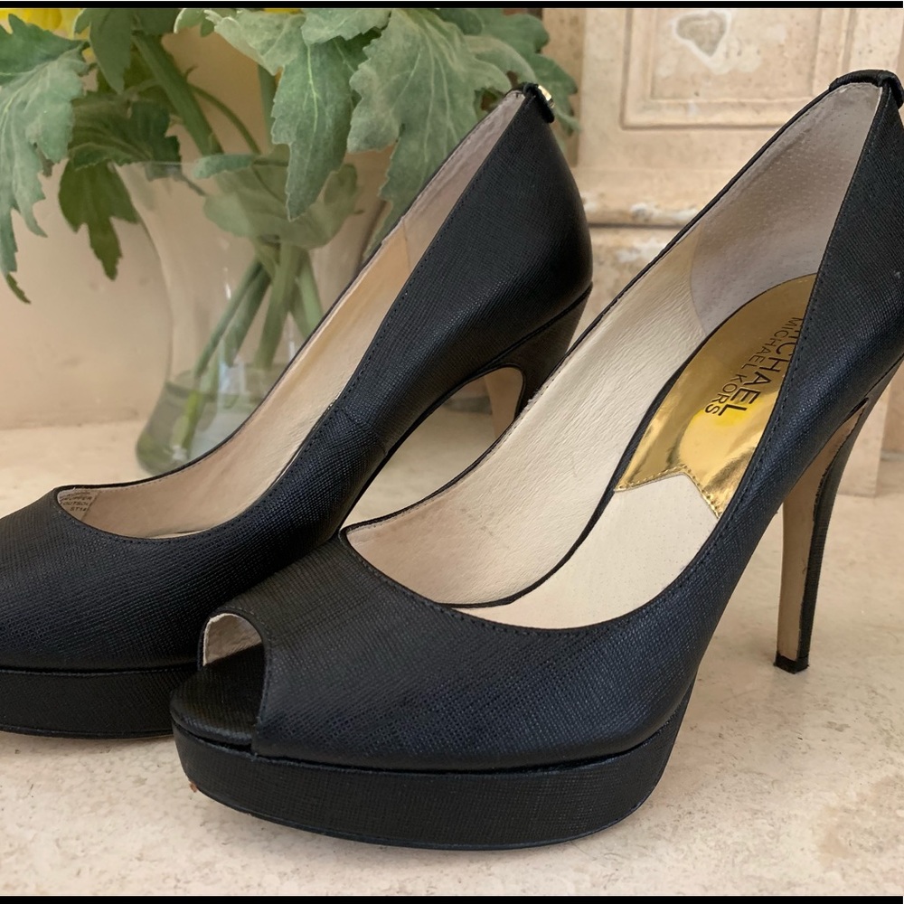 Micheal Kors black open toed heels.
